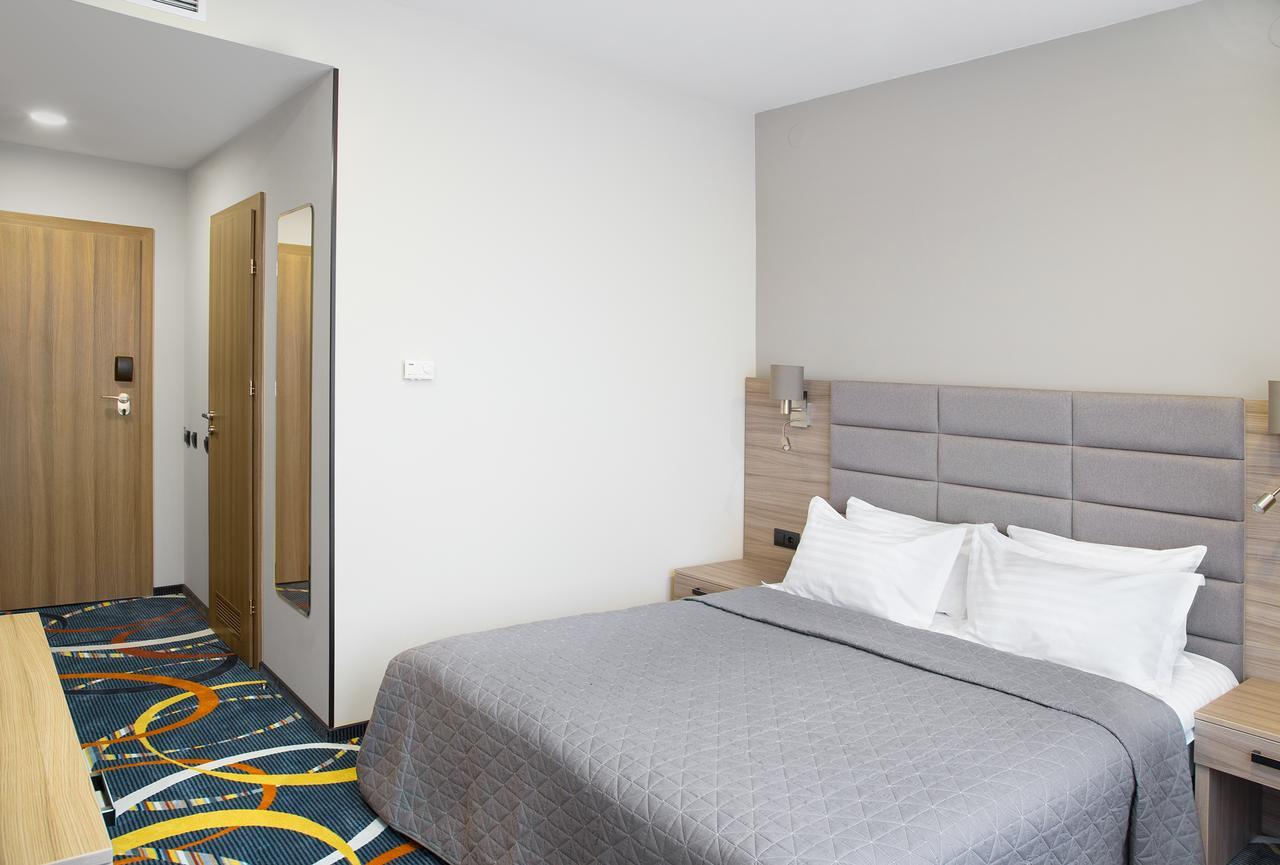 Willing Hotel Minsk Extérieur photo